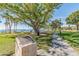 Beautiful park with lush greenery, mature trees, and a scenic waterfront view at 2500 Boone Ct, Sarasota, FL 34237