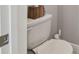 Image of a toilet and cleaning supplies in a well maintained bathroom at 2500 Boone Ct, Sarasota, FL 34237