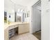 Bathroom featuring spacious vanity area and large mirror at 2511 Lantana Ln, Palmetto, FL 34221