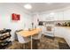 Bright kitchen with adjacent dining area and modern appliances at 2511 Lantana Ln, Palmetto, FL 34221