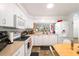 Bright kitchen with white cabinets and stainless-steel appliances at 2511 Lantana Ln, Palmetto, FL 34221