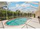 The screened in pool area offers privacy and relaxation at 25433 Colon Dr, Punta Gorda, FL 33983