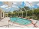 The screened in pool area offers privacy and relaxation at 25433 Colon Dr, Punta Gorda, FL 33983