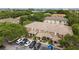 Charming multi-Gathering exterior elevation featuring well-maintained landscaping and ample parking at 2553 Harn Blvd # 1, Clearwater, FL 33764