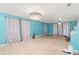 Bright and spacious living room featuring tile flooring and large windows at 2553 Harn Blvd # 1, Clearwater, FL 33764