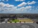 Spacious property with grassy area, paddocks, outbuildings and mature trees at 26147 L And J Rd, Myakka City, FL 34251