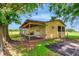 Rustic barn featuring a wooden structure, providing shelter and functionality in a charming outdoor setting at 26147 L And J Rd, Myakka City, FL 34251