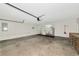 Spacious garage featuring a washer, a dryer, and a utility sink at 26147 L And J Rd, Myakka City, FL 34251