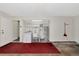 Well-equipped garage with washer, dryer, shelving, and utility sink, offering practicality and organization at 26147 L And J Rd, Myakka City, FL 34251