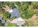 Bird's eye view of house showing roof, yard, and landscaping, highlighting the lot's shape and location at 2866 E Rainbow Cir, Sarasota, FL 34231