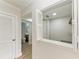 Hallway desk area with shelving featuring white counters, light wood, and white walls at 3005 Chianti Ct # 103, Sarasota, FL 34237