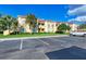 A view of the exterior of a multi-Gathering building with parking available at 3005 Chianti Ct # 103, Sarasota, FL 34237