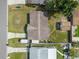 Aerial view of a home showing the roof, driveway, yard, and surrounding neighborhood at 3211 Deerfield Dr, Tampa, FL 33619