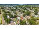 Aerial view of house with tree coverage and other houses at 3211 Deerfield Dr, Tampa, FL 33619