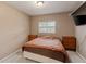 A bedroom with neutral walls, two dressers and a window with blinds at 3211 Deerfield Dr, Tampa, FL 33619