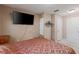 Bedroom featuring a TV and neutral tones at 3211 Deerfield Dr, Tampa, FL 33619