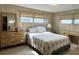 Cozy bedroom featuring natural light, neutral color palette, and matching furniture at 3224 Aspen Ter, Sarasota, FL 34237