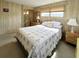 Bright bedroom with a comfortable bed, soft lighting, and a relaxing atmosphere at 3224 Aspen Ter, Sarasota, FL 34237