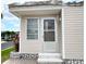 Welcoming entrance featuring a storm door and decorative brickwork, creating a charming and secure entryway at 3224 Aspen Ter, Sarasota, FL 34237