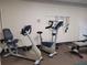The gym space offers stationary bikes, resistance bands, and free weights at 3224 Aspen Ter, Sarasota, FL 34237
