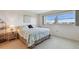 Cozy bedroom featuring a comfortable bed, natural light, and relaxing ambiance at 3680 Ironwood Circle # 704-L, Bradenton, FL 34209