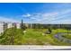 Beautiful golf course view from the property overlooking the green and lush landscaping at 3680 Ironwood Circle # 704-L, Bradenton, FL 34209