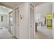 Hallway showing a glimpse of the living room and bedroom at 3680 Ironwood Circle # 704-L, Bradenton, FL 34209