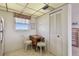 Cozy kitchen area features a small table with chairs by the window, and a closet at 3680 Ironwood Circle # 704-L, Bradenton, FL 34209