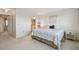 Comfortable main bedroom showcases ensuite bathroom and spacious layout at 3680 Ironwood Circle # 704-L, Bradenton, FL 34209