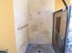 Convenient outdoor shower featuring neutral tile and a grab bar for added safety at 3680 Ironwood Circle # 704-L, Bradenton, FL 34209