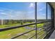 Large screened balcony overlooking the golf course and serene pond at 3680 Ironwood Circle # 704-L, Bradenton, FL 34209