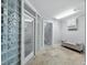 Finished basement with a seating area and glass block window at 3959 Somerset Dr # 5, Sarasota, FL 34242