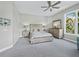 Serene main bedroom featuring soft neutral tones, ensuite, and ample natural light at 3959 Somerset Dr # 5, Sarasota, FL 34242