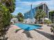 Inviting pool area with comfortable lounge chairs, offering a perfect spot for relaxation and enjoyment at 3959 Somerset Dr # 5, Sarasota, FL 34242