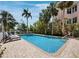 Refreshing pool surrounded by brick pavers offers a private oasis for relaxation and recreation at 3959 Somerset Dr # 5, Sarasota, FL 34242