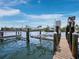 Private boat dock with lifts, ready for boating and enjoying waterfront living at 3959 Somerset Dr, Sarasota, FL 34242