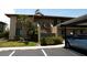 Inviting two-story condo featuring neat landscaping and covered parking for residents and guest parking available at 4016 Oakview Dr # J6, Punta Gorda, FL 33980