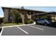Attractive condo complex with covered parking, guest parking, and verdant landscaping for a welcoming appearance at 4016 Oakview Dr # J6, Punta Gorda, FL 33980