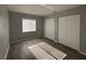 A quaint bedroom with a window for natural light and two spacious closets at 4031 Wake Ave, Sarasota, FL 34241