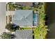 Aerial view of the home's roof and screened-in pool enclosure at 4426 Useppa Dr, Bradenton, FL 34203