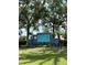 Sabal Harbour entrance sign surrounded by lush landscaping and mature trees on a sunny day at 4426 Useppa Dr, Bradenton, FL 34203