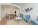Open-concept living space with modern furnishings and lots of natural light and neutral paint color at 4426 Useppa Dr, Bradenton, FL 34203