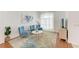 Inviting living area with light-colored walls, modern furniture, and ample natural light at 4426 Useppa Dr, Bradenton, FL 34203