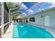 Private screened-in pool and spa with direct access to the house and backyard at 4426 Useppa Dr, Bradenton, FL 34203