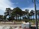 Community putt-putt golf coarse and mature landscaping at 4845 Boca Raton Ave, Sarasota, FL 34234