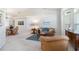 Bright living room and dining area with ample light and comfortable seating at 4845 Post Pointe Dr, Sarasota, FL 34233