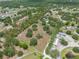 Expansive aerial view of vast land with mature trees at 5034 257Th E St, Myakka City, FL 34251
