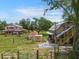 Charming two-story home with detached outbuildings and a spacious yard at 5034 257Th E St, Myakka City, FL 34251