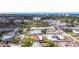 Scenic aerial view of a tranquil neighborhood, showcasing well-kept properties and lush green surroundings at 516 Parkdale Mews # 516, Venice, FL 34285