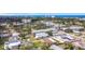 Gorgeous aerial view of a desirable neighborhood near the ocean, surrounded by mature trees at 516 Parkdale Mews # 516, Venice, FL 34285